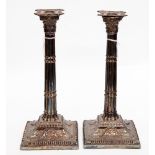 A pair of old Sheffield plate, Corinthian candlesticks, approx 31cm high,