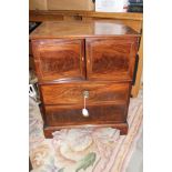 A George III mahogany commode,