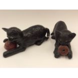 A pair of Bretby cats,