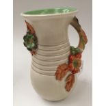 Clarice Cliff for Newport Pottery, a My Garden flower moulded single handle vase of baluster form,