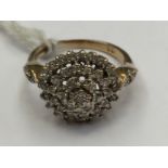 A 9ct gold diamond multi tier cluster ring, diameter of head approx 12mm,