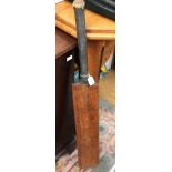 A 1930s cricket bat, Gun & Moore, Nottingham, treble spring,
