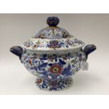 A pedestal tureen & cover. Hand painted in Imari pallet. Some restoration.