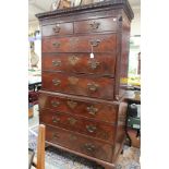 A George III mahogany chest on chest, circa 1770, the cornice with blind fretwork decoration,