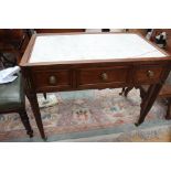 A Regency marble topped serving table, raised on turned legs,