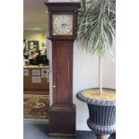 A George III Oak 30 Hour Long Cased Clock. Silvered dial inscribed "Sam Harris".