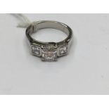 A diamond three stone platinum ring, set with three Asscher cut diamonds,