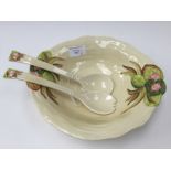 A Clarice Cliff salad bowl and salad servers, Newport Pottery, No.