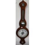 A 19th Century mahogany banjo barometer and thermometer together with an oak wall mirror (2)