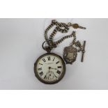 A silver open faced pocket watch on a silver chain