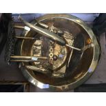 An oval twin handled brass tray, measuring approx 59 cm by 46 cm, with a brass bowl,