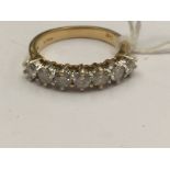 A diamond seven-stone 18ct yellow gold ring, total diamond weight approx 1.