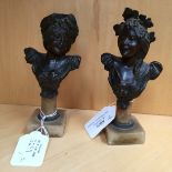 A pair of spelter busts on marble column and base (2)