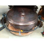 A large copper pan and cover, measuring approx 50 cm long, 34 cm wide and 30 cm high,