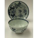 An 18th Century blue and white tea bowl and saucer, AF,