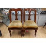 A set of eight Victorian dining chairs, upholstered seats,