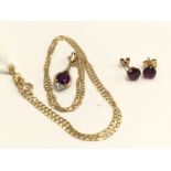 A 9ct gold amethyst and diamond necklace, tear drop shaped with a 9ct gold chain,