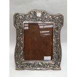 A silver Art Nouveau photograph frame made by William Neale with hallmarks for Chester 1904 with