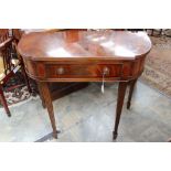 A Georgian style mahogany demilune side table, fitted with a single drawer,