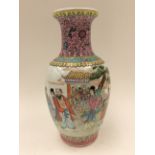 A Chinese Republican vase, Qianlong style, decorated with cast figures and a verse, shouldered form,