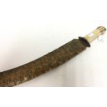 Indian made curved short sword. Bone handle. Etched 57cm blade with designs of snakes.