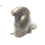 A Brass Firemans Helmet. Complete with liner and chinstrap.