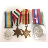 WW2 British Defence Medal, War Medal 1939-45 and Italy Star. All with ribbons.