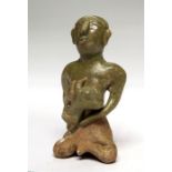 Sukhothai Nursing Mother Statuette, 13th-15th century AD A glazed ceramic statuette of a female,