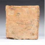 Roman roof tile with maker’s mark. A rectangular ceramic pale orange roof tile. Impressed to the