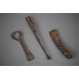 Implements Group, 9th-12th century AD.   A group of three iron implements consisting of a hammer,