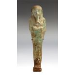 Egyptian faience shabti, Late Dynastic Period, C. 664 -332 BC.   Egyptian green glazed faience