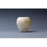 Kohl Pot, New Kingdom, 1550-1077 BC A alabaster kohl pot with flat rim and globular body. Size: 6.