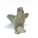 A Roman bronze statuette of an eagle also referred to as an aquila, wings folded back against the