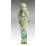 Egyptian faience shabti, Late Dynastic Period, C. 664 - 332 BC.   Egyptian green glazed faience