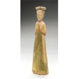Chinese Northern Wei Dynasty Tomb Figure of a Female, 386-534 AD A glazed ceramic figure of a