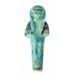 Egyptian Faience Shabti Figure, Third Intermediate Period, C. 730 BC. A vibrant blue glazed