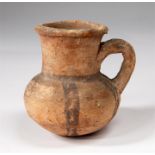 A rare Egyptian New Kingdom pottery jug with a flat base and tall neck. Hand burnished, the exterior