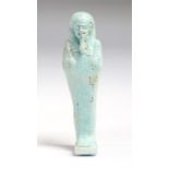 Egyptian faience shabti figure, Late Dynastic Period, C. 664 BC - 332 BC. A beautiful light blue