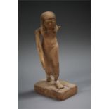 Egyptian wooden striding female figure, Middle Kingdom, 12th – 11th Dynasty, 2055 – 1650 BC.  A