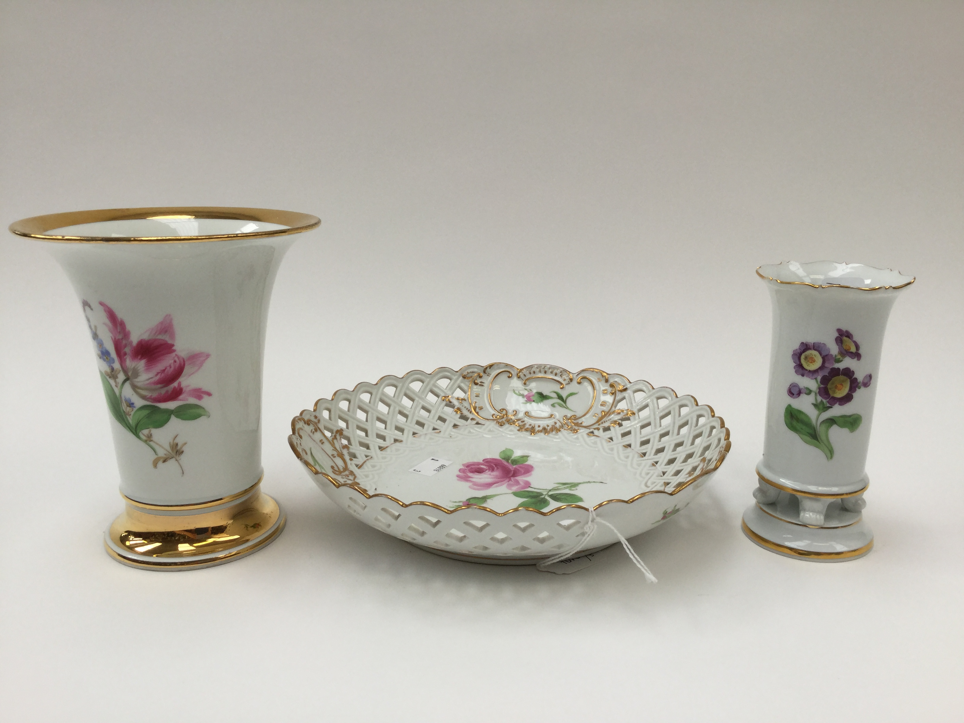 A Meissen 20th Century two hand painted vases,
