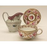 A Coalport tea cup and saucer, circa 1835, painted with pink roses,