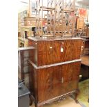 An early 20th Century mahogany wine cooler, lead lined interior,