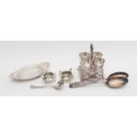 Two silver plated spoons by "SSP Ltd A", a set of four egg cups with stand,