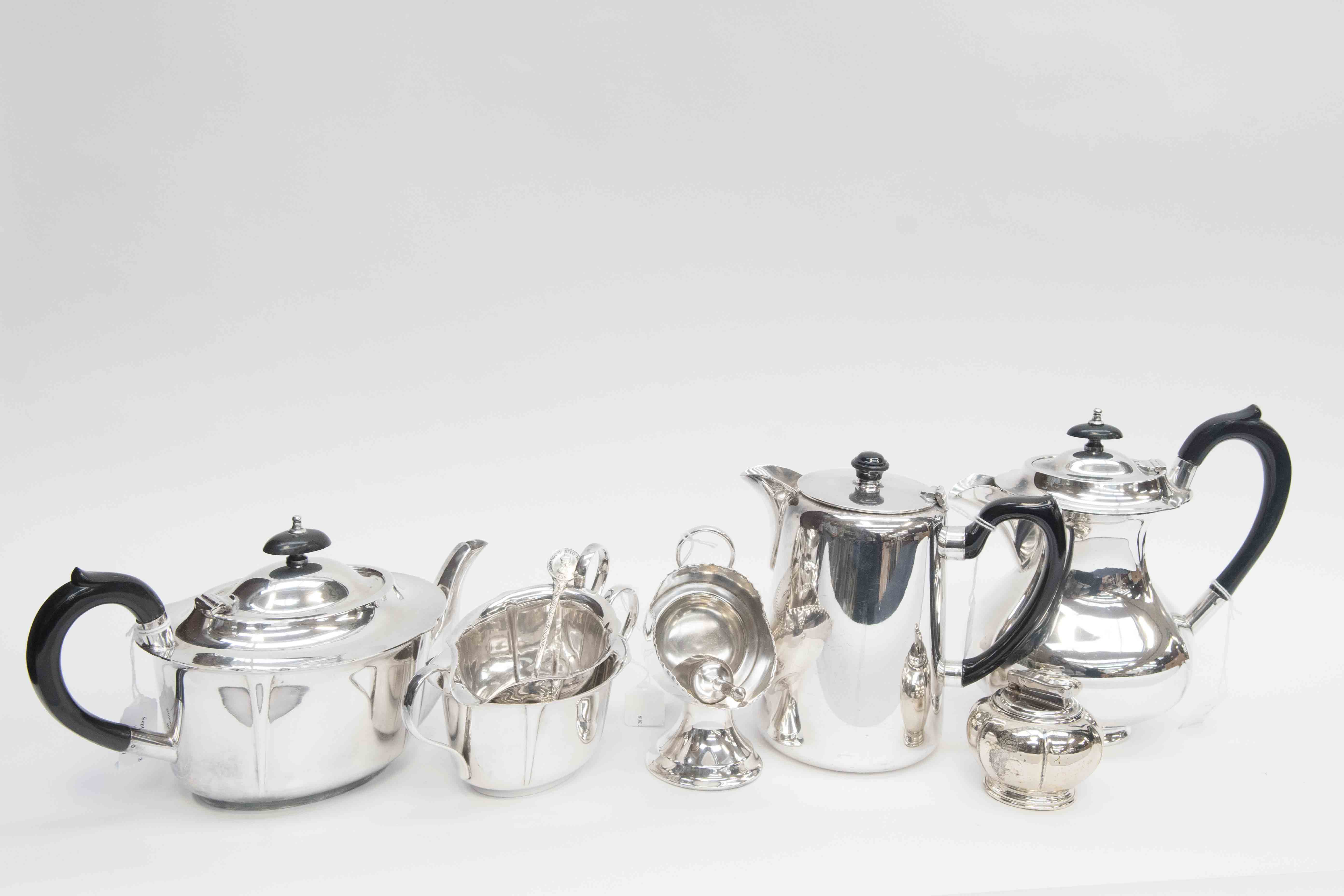 An EPNS tea/coffee service with additional EPBM sugar scuttle and a calibri lighter (7)