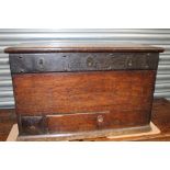 A George III oak oak strong box, iron bound and fitted with three locks, two drawers to base,