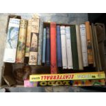 One box of assorted books to include annuals and others.