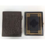 Two Victorian embossed photograph albums,