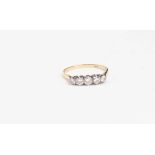 A diamond five stone eternity ring, set in 18ct gold, brilliant cut diamonds, size S,