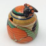 Clarice Cliff for Newport Pottery, a small Summer house beehive honey pot, Bizarre mark, approx 7.