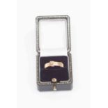 A Victorian 9ct gold buckle ring, engraved to the inside of shank, size P1/2,